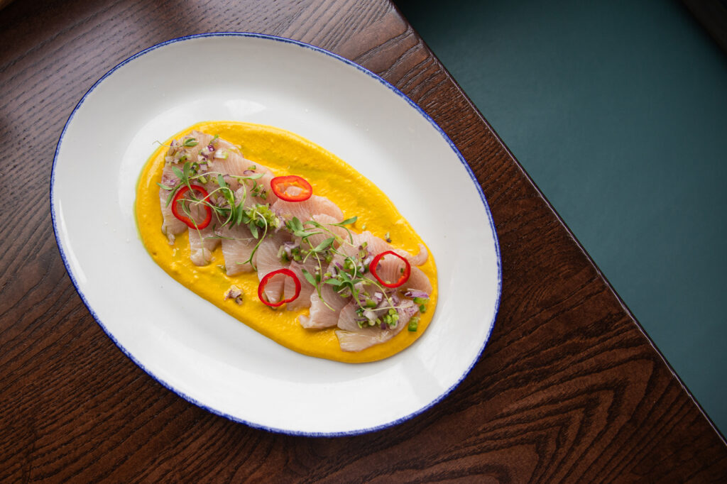 Amberjack tiradito dish plated at the restaurant
